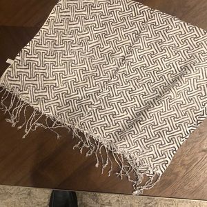 Twos company shawl/scarf.     Measures 22x66. Made of 90 viscose and 10 metallic